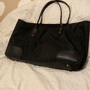 Gucci black handbag.